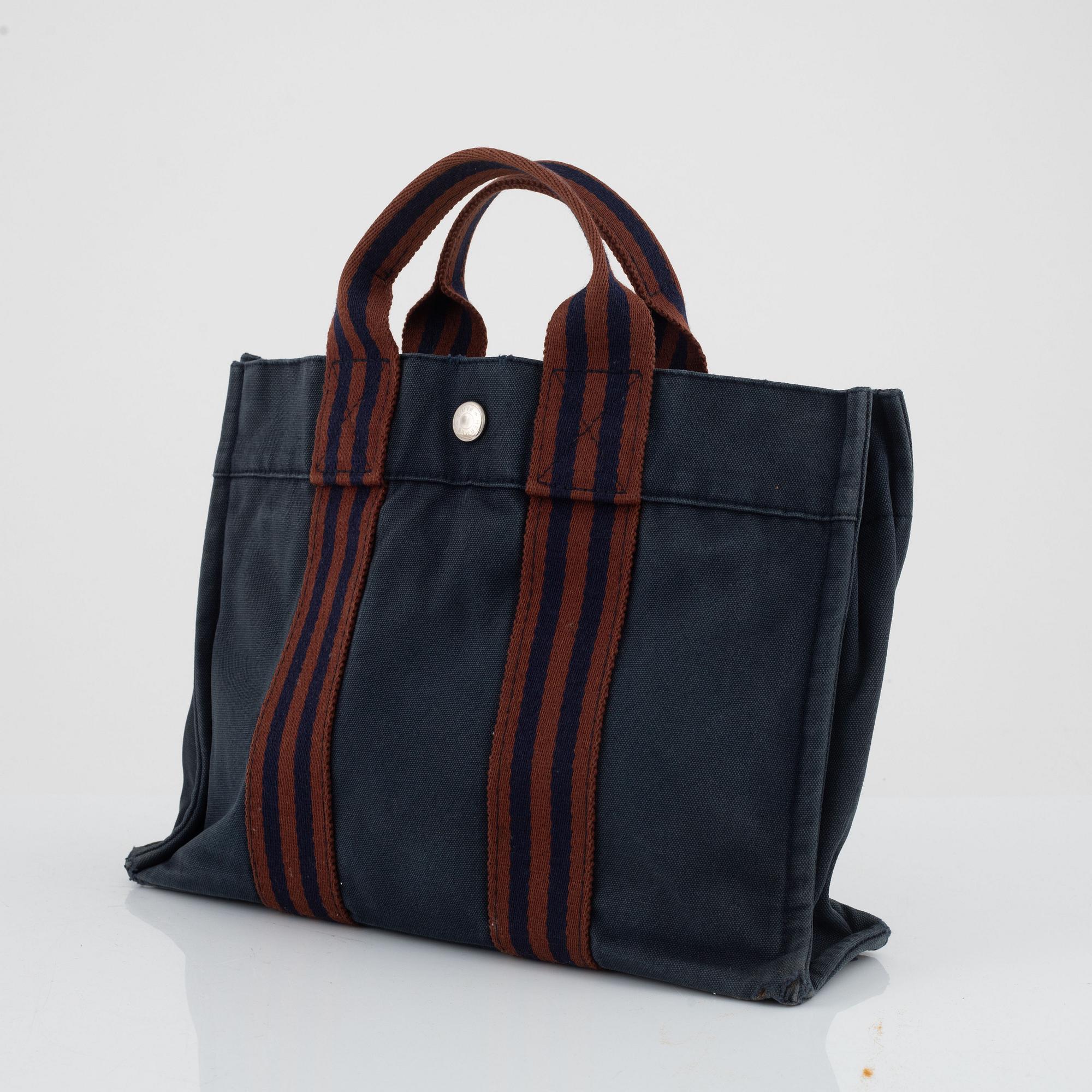 Hermès, "Fourre tout PM" bag and toiletry bag.