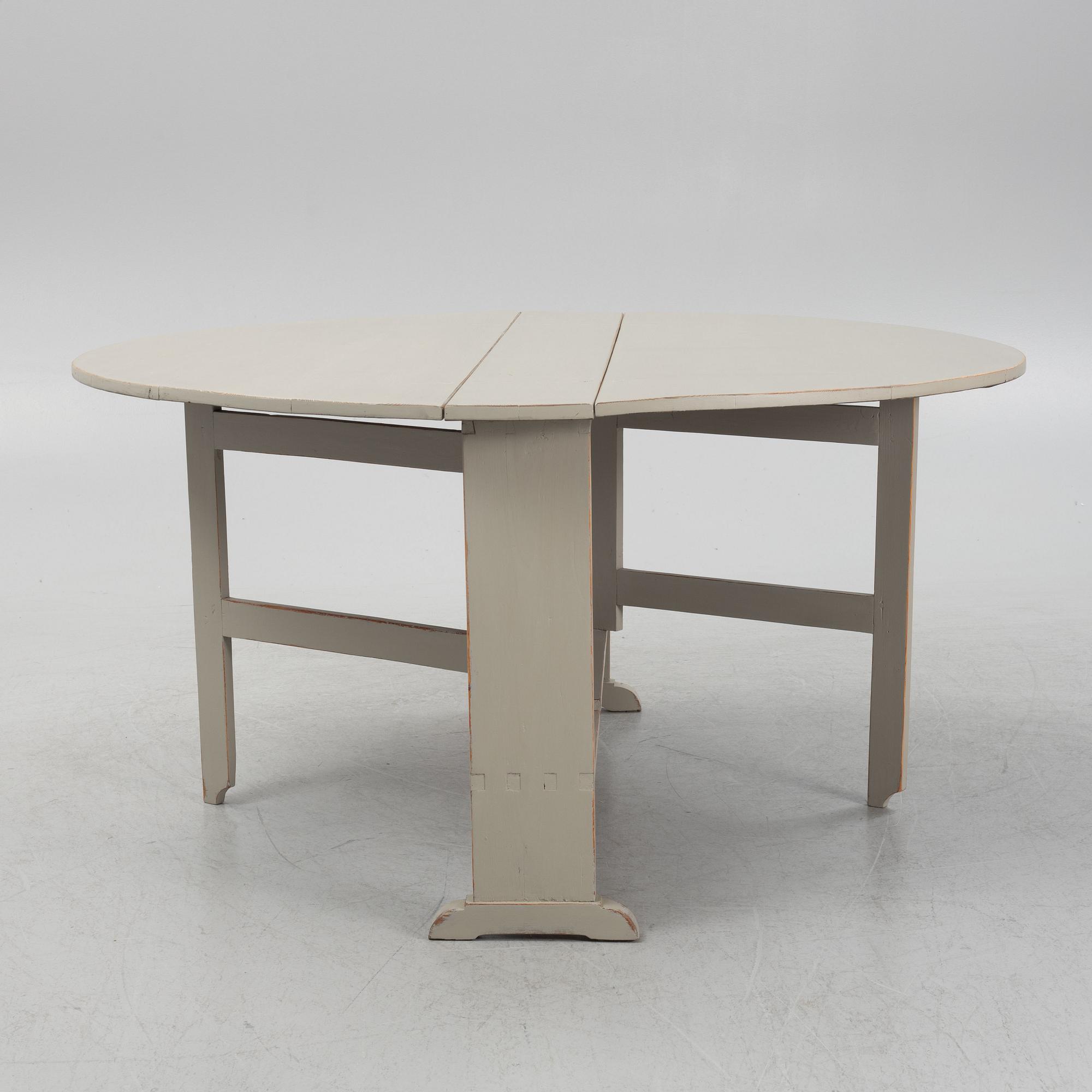 A painted gate-leg table, 19th Century.