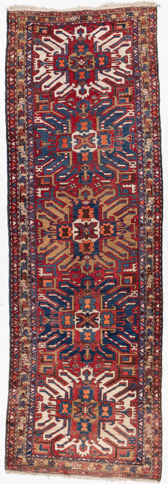 A runner carpet, North Western Iran, c. 317 x 107 cm.