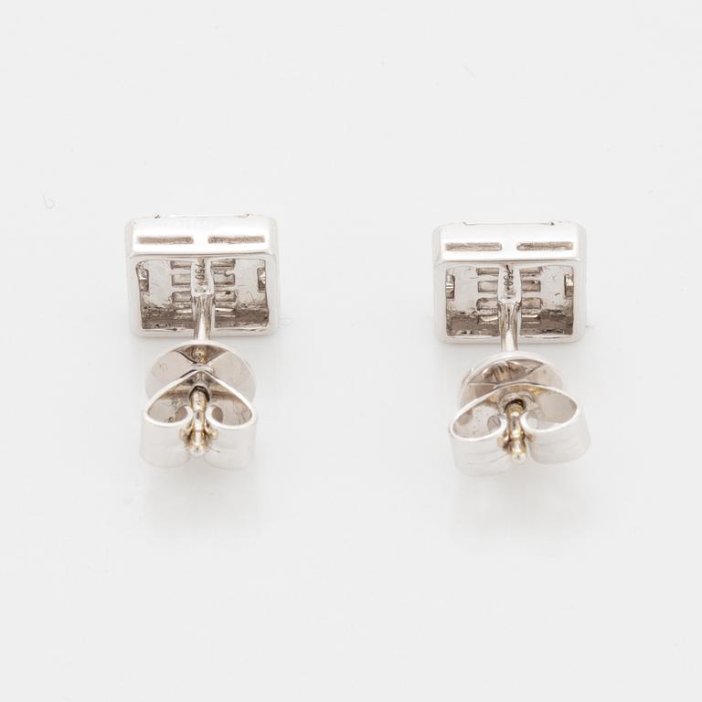 Baguette and brilliant-cut diamond earrings.