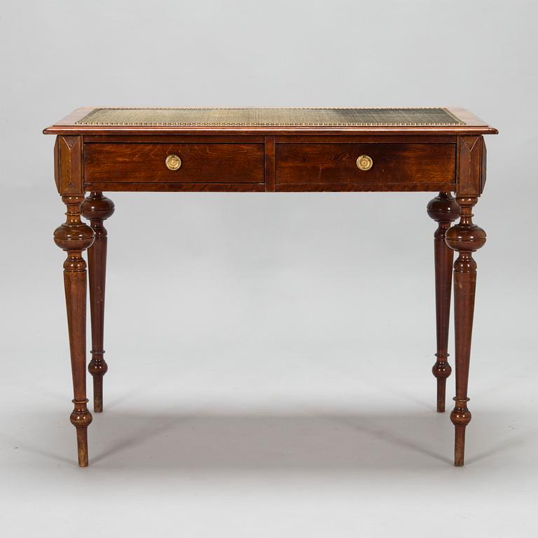 A Renaissance style writing desk from around the year 1900.