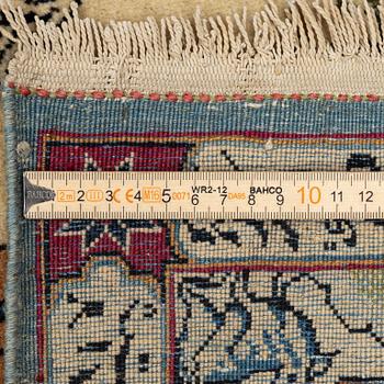 A semi-antique pictoral Kashan rug, Central Persia, c. 206 x 138 cm.