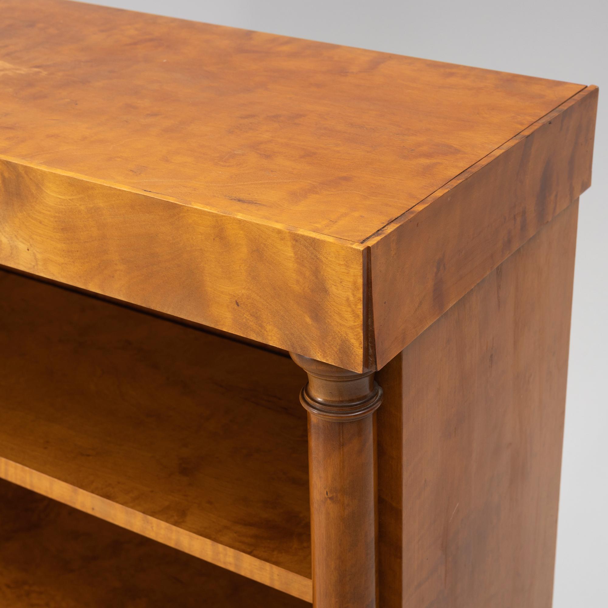 An Empire style bookcase, first half of the 20th century.