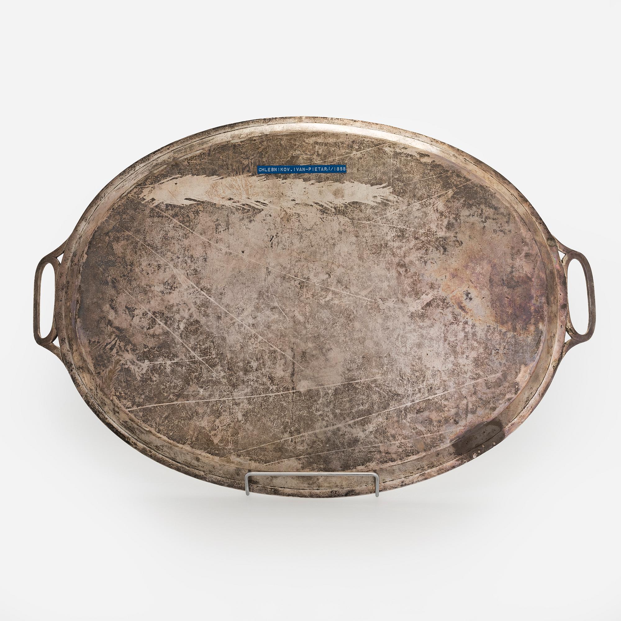 A Khlebnikov silver tray, with the Imperial court supplier's mark, Moscow 1888.