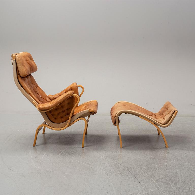 Bruno Mathsson, a "Pernilla" lounge chair with ottoman, DUX, Sweden, late 1900's.
