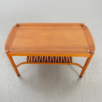 An NK  1950/60s teak coffee table.