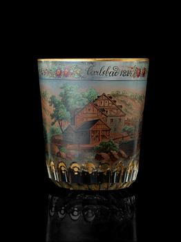 A Bohemian beaker glass, dated Carlsbad 1824.