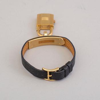 A watch "Kelly Lock" by Hermès.