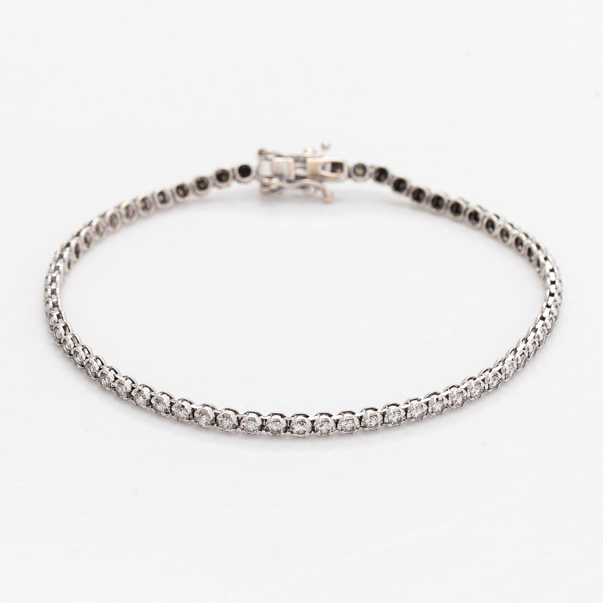 Tennis bracelet, brilliant-cut diamonds totalling 2.70 ct, 18K white gold, Italy.