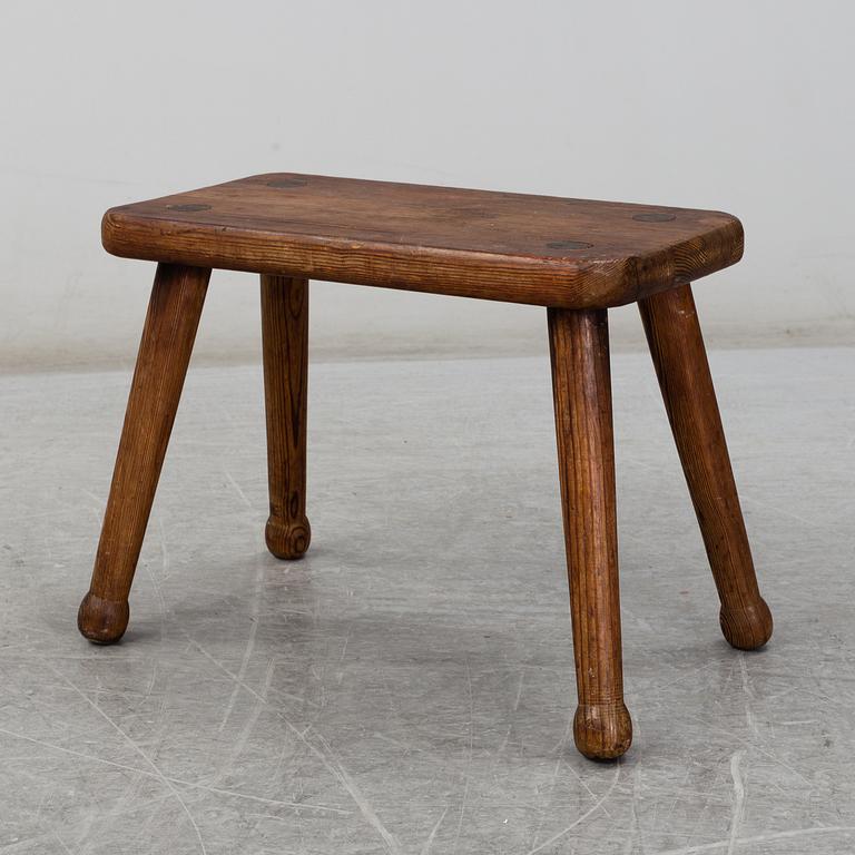 A late 20th Century stool.