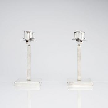 Rolf Engströmer, attributed to, a pair of silver plated candelabra, Fabriksaktiebolaget Kronsilver, Sweden 1930s.