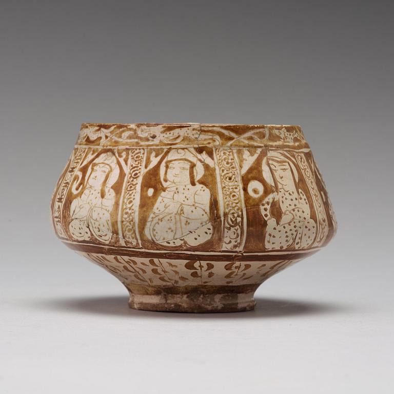 A BOWL, pottery with luster decor, height ca 10,5 cm, Persia/Iran 12th-13th century.