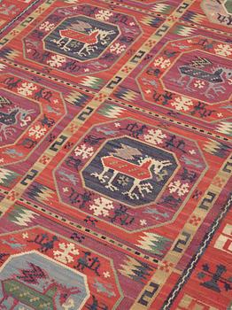 A CARPET, "Bäckahästen", a fine flat weave, 309 x 196,5 cm, signed MMF.