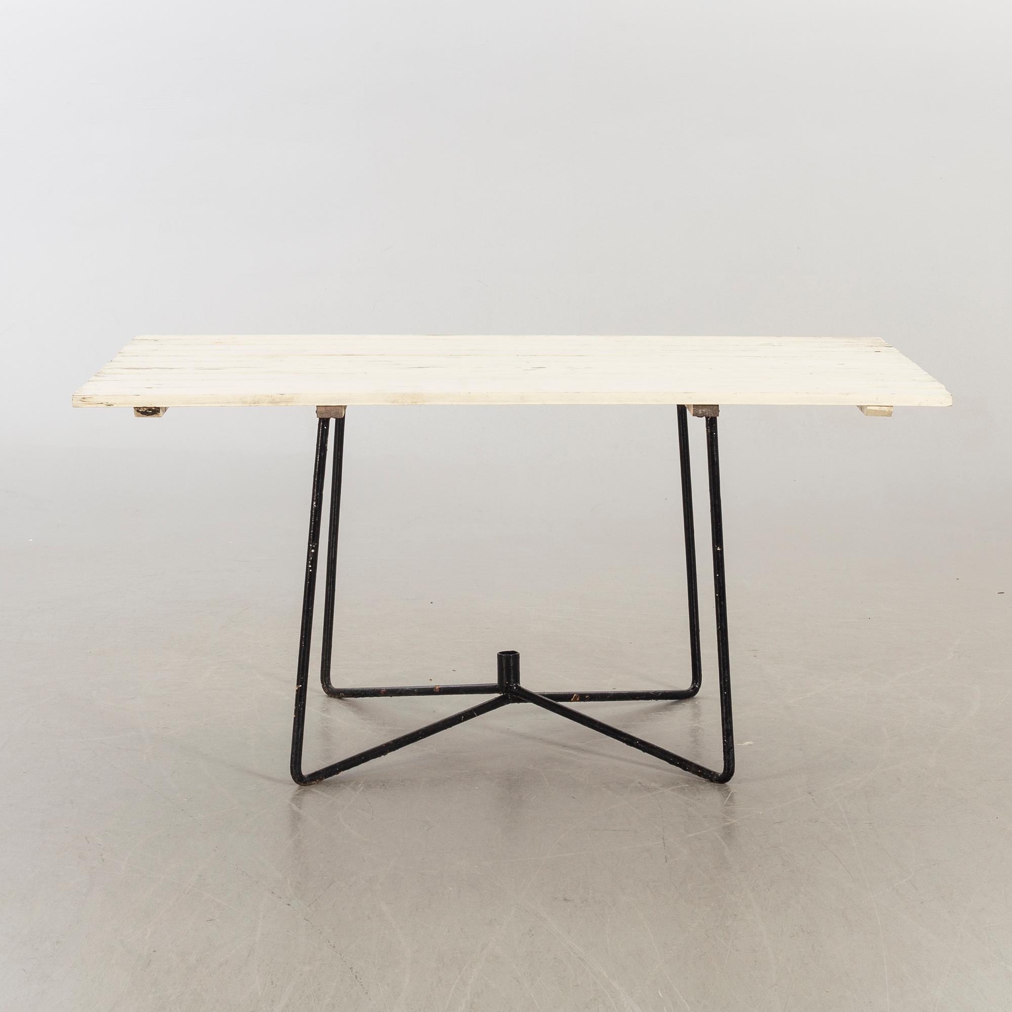 A GARDEN TABLE MID 20TH CENTURY.