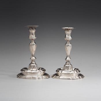 A pair of Swedish mid 18th century silver candlesticks, marks of Petter Åkerman, Stockholm 1756.