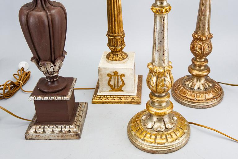 Four mid 20th century wood table lamps from Paoletti, Firenze Italy.