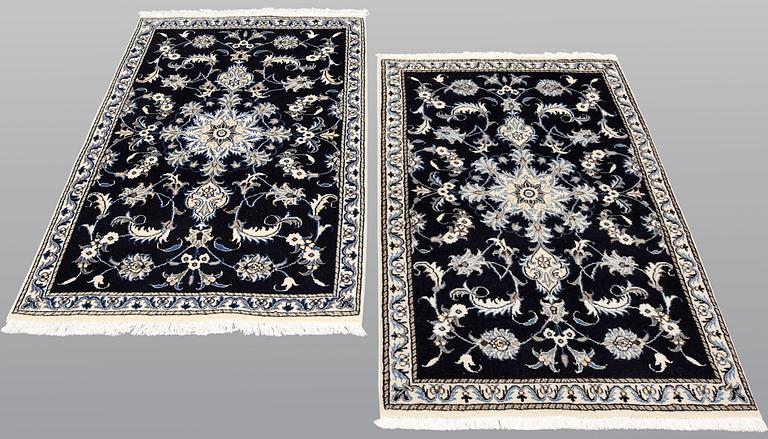 A pair of Nain rugs, ca 135 x 90 & 134 x 89 cm.