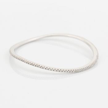 An Ole Lynggaard 18K white gold "Love" bangle set with round brilliant-cut diamonds, design Charlotte Lynggaard.