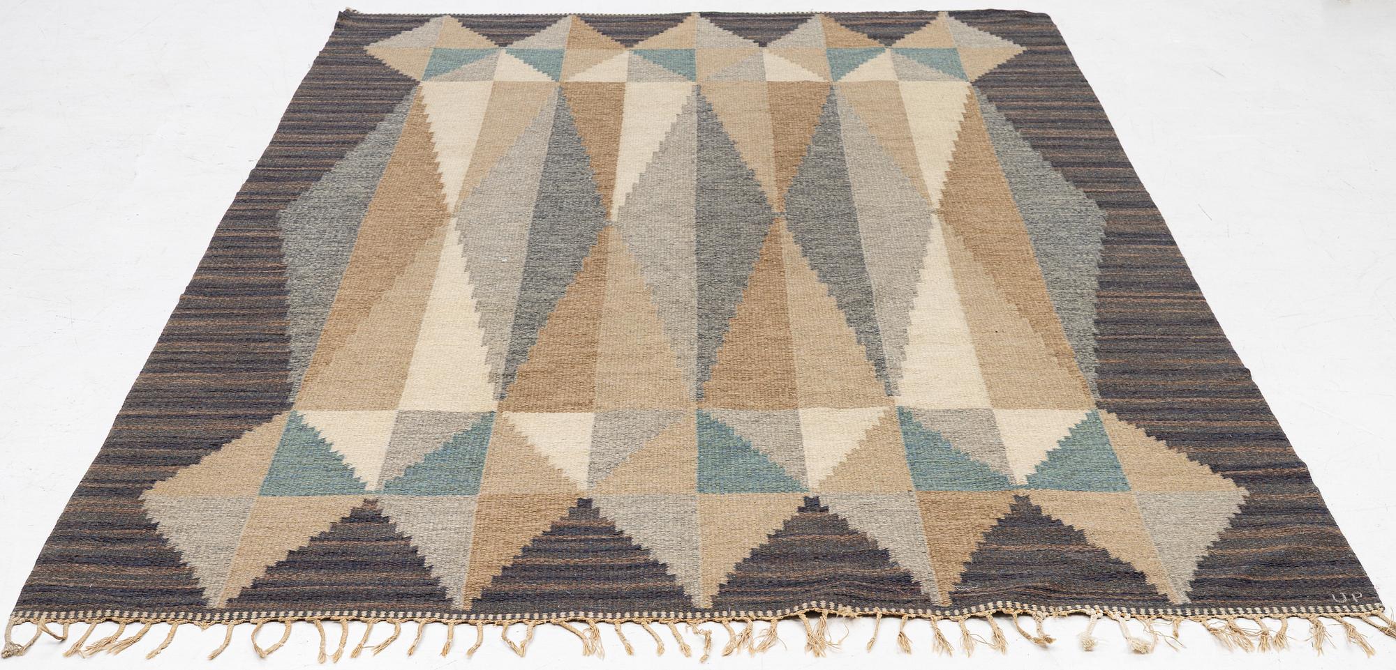 Ulla Parkdal, a flat weave carpat, c.. 304 x 196 cm, signed UP.