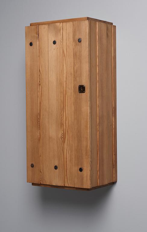 An Axel Einar Hjorth pine wall cabinet, Nordiska Kompaniet, Sweden 1930's.