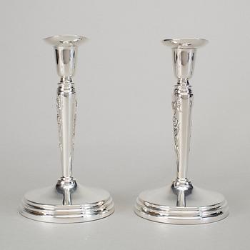 A pair of silver candlesticks by Meya Lerible for Mema, Linköping 1994.