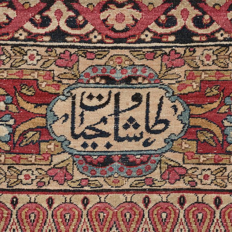 A CARPET, an antique Kerman Laver, ca 363 x 301 cm.