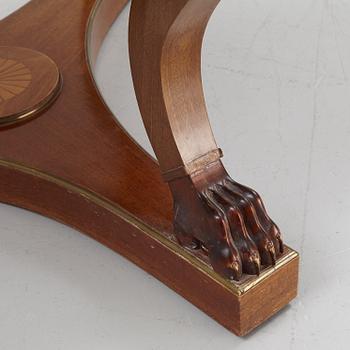 A mahogany veneered Empire style table, first half the 20th Century.