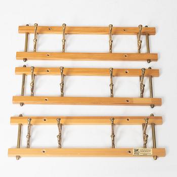 A set of three 'Decorative' coat hangers, Skoglunds metallgjuteri, Anderstorp, 1950s/60s.