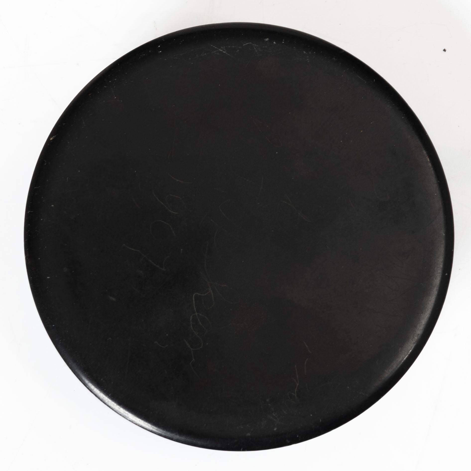 A French lacque noir, tortoiseshell and ormolu snuffbox with a medallion after Claude Galle, early 19th century.