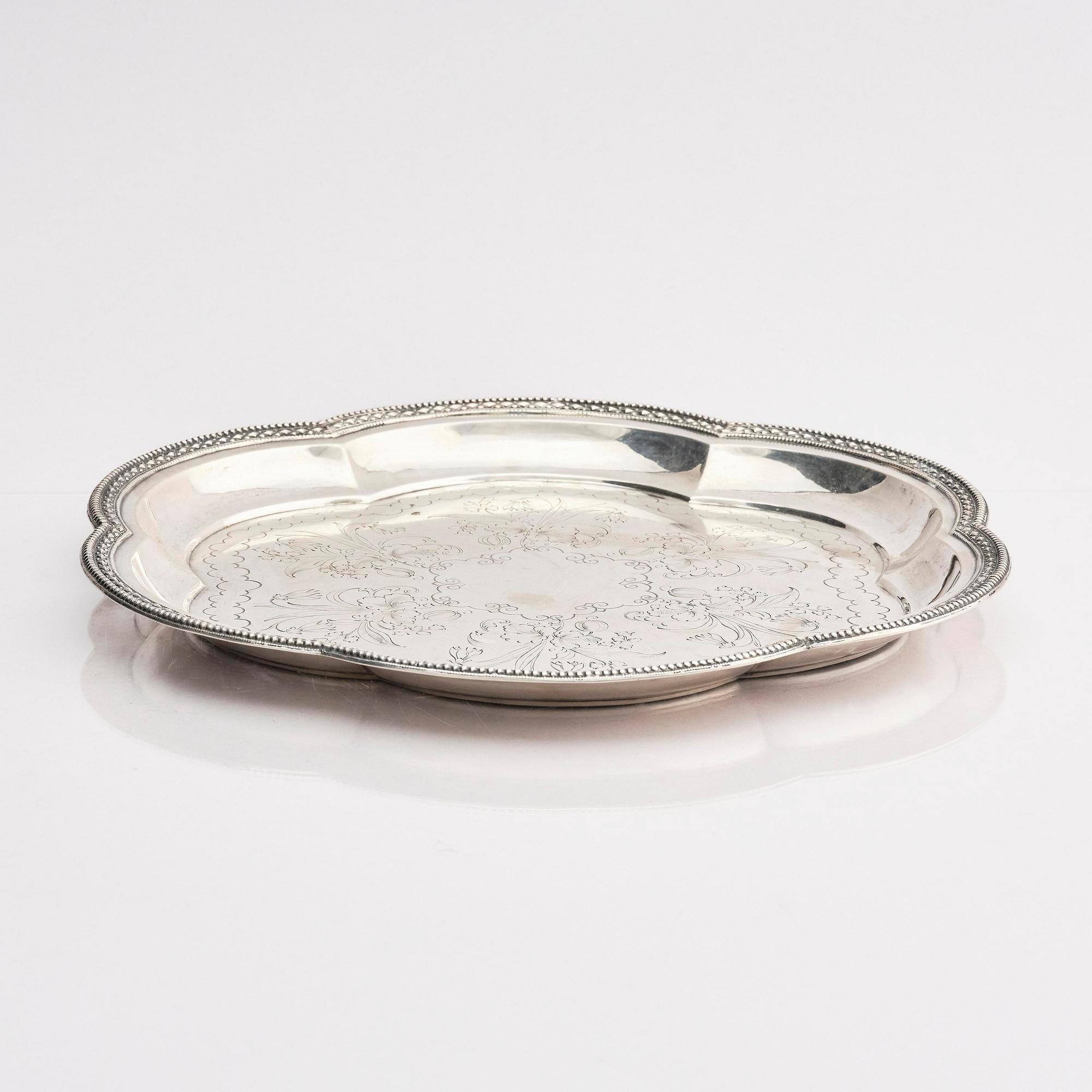 A silver dish by Lars Larson & Co Stockholm 1876.