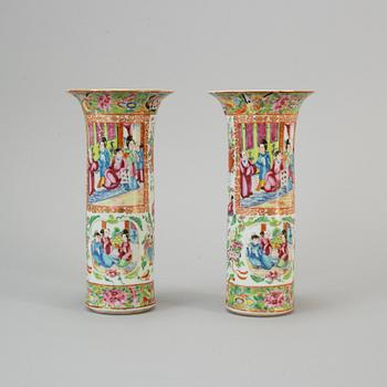 A pair of famille rose Canton trumpet vases, Qing dynasty, 19th century.