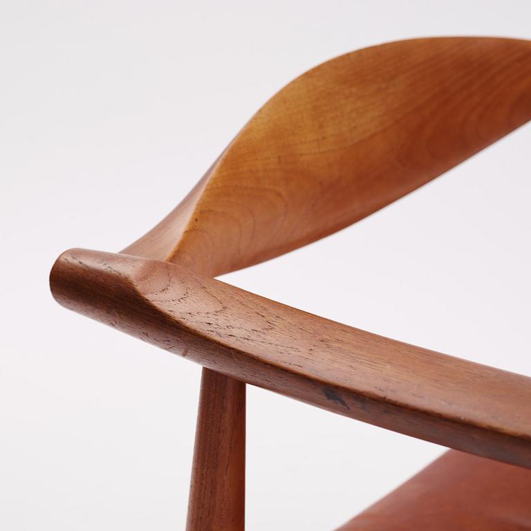 Hans J Wegner, a teak and brown leather 'CH-35', Carl Hansen & Son, Denmark 1950-60s.