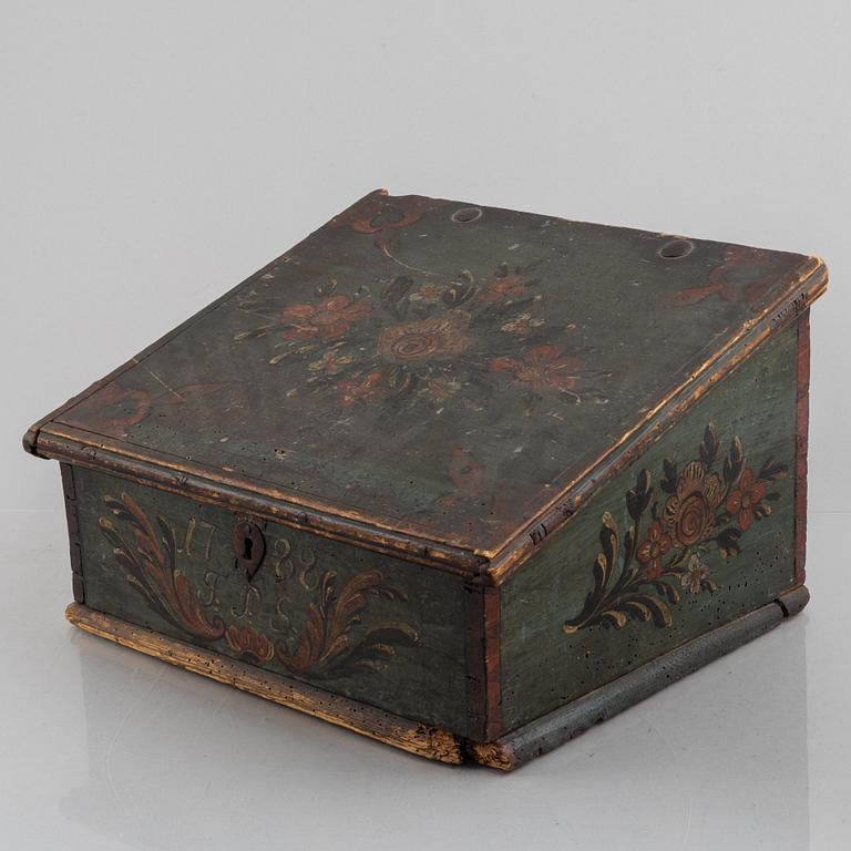A Swedish polychrome-painted writing box, dated 1788.