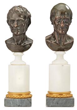 592. A pair of late Gustavian late 18th century busts depicting Rosseau and Voltaire.