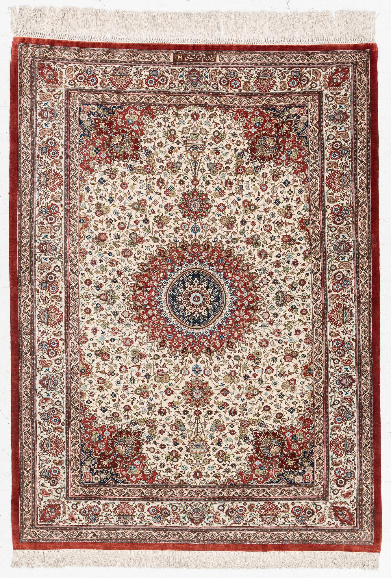 A silk Qum, Central Persia, signed Jashmedi c. 141 x 103 cm.