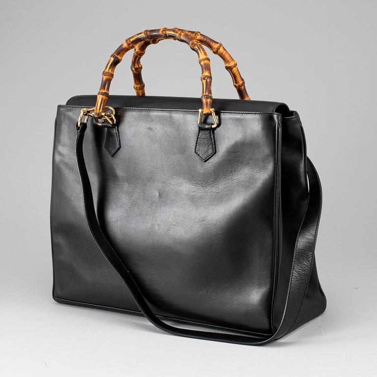GUCCI, a leather bag/briefcase.