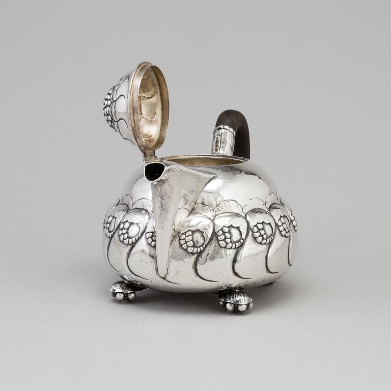 A Danish Art Nouveau silver teapot, maker's mark EVALD NIELSEN, Copenhagen, 1919.