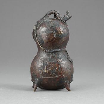 KLOCKA, mässing, möjligen Tibet, 1800-tal.
