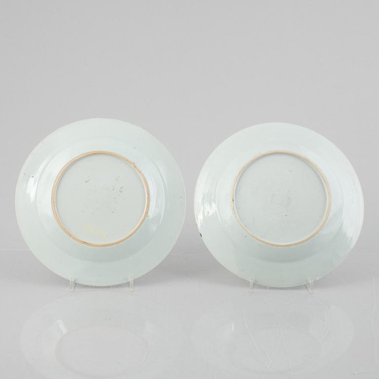 A pair of porcelain plates and a saucer, China, Qianlong (1736-95).