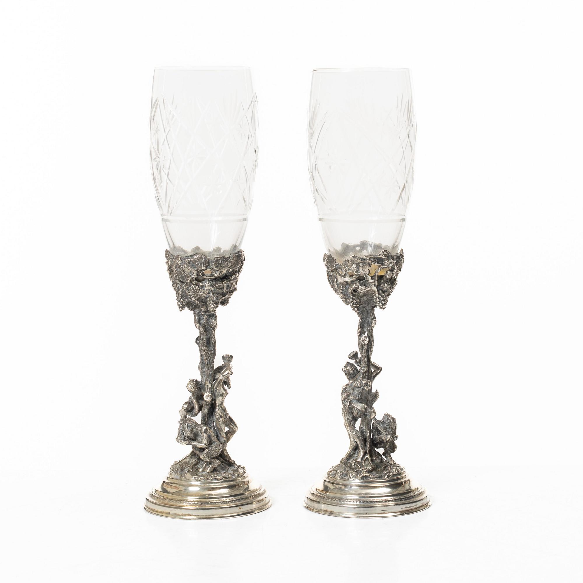 Champagne glasses, a pair, silver and glass, 20th century.