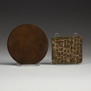 A bronze mirror, and plaque, partly Jin dynasty (1115-1234).