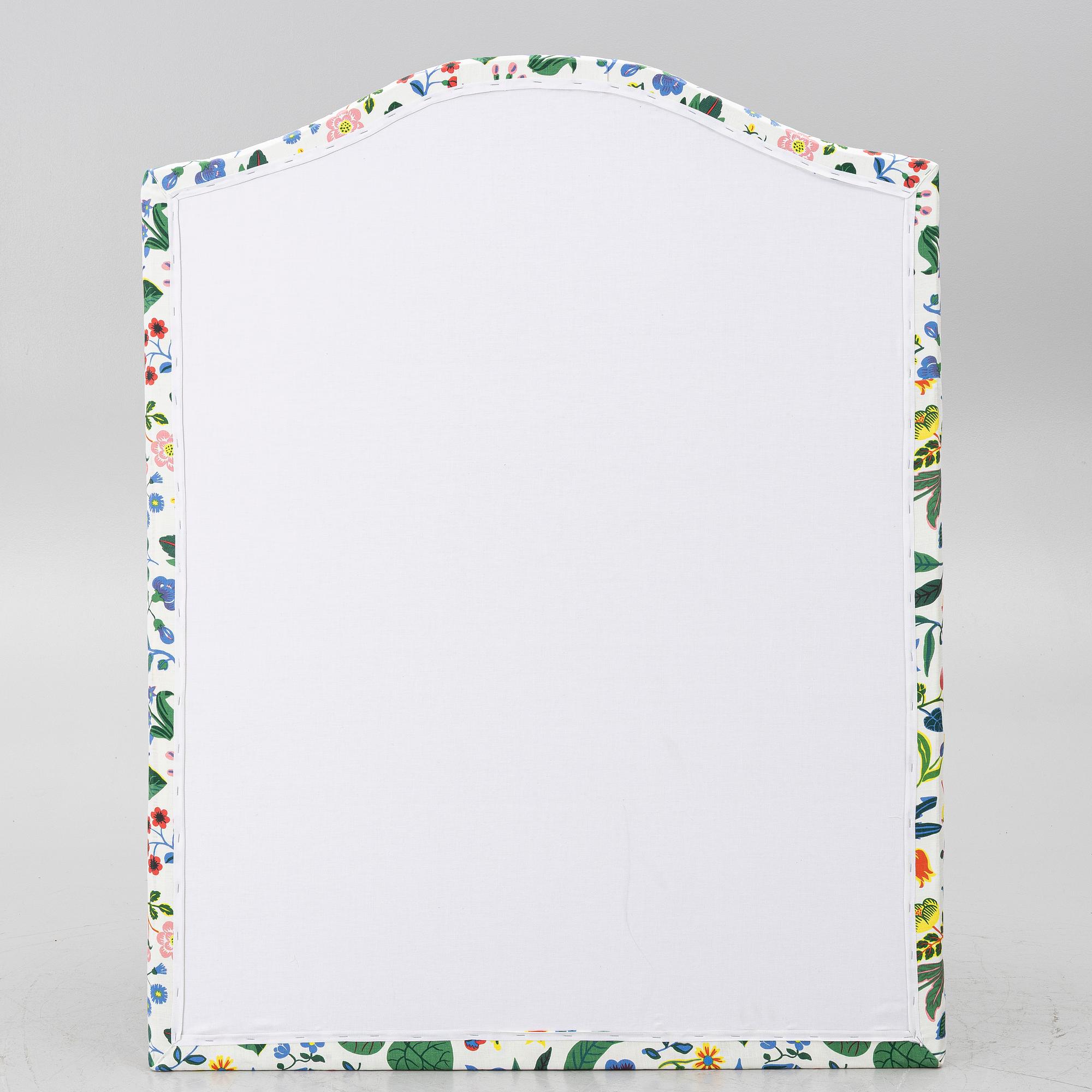 Headboard, upholstered in fabric from Svenskt Tenn.