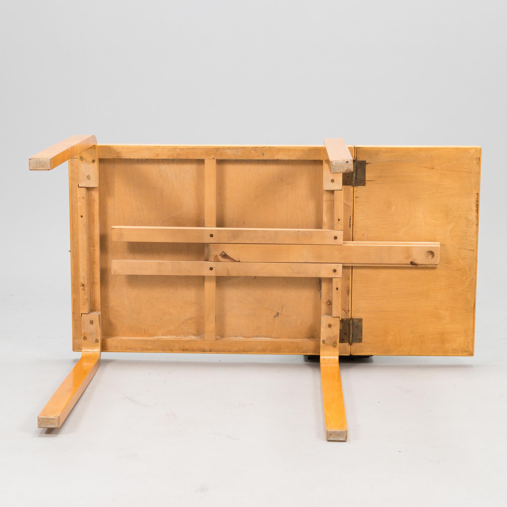 ALVAR AALTO, A mid-20th century drop leaf table for Artek Finland.