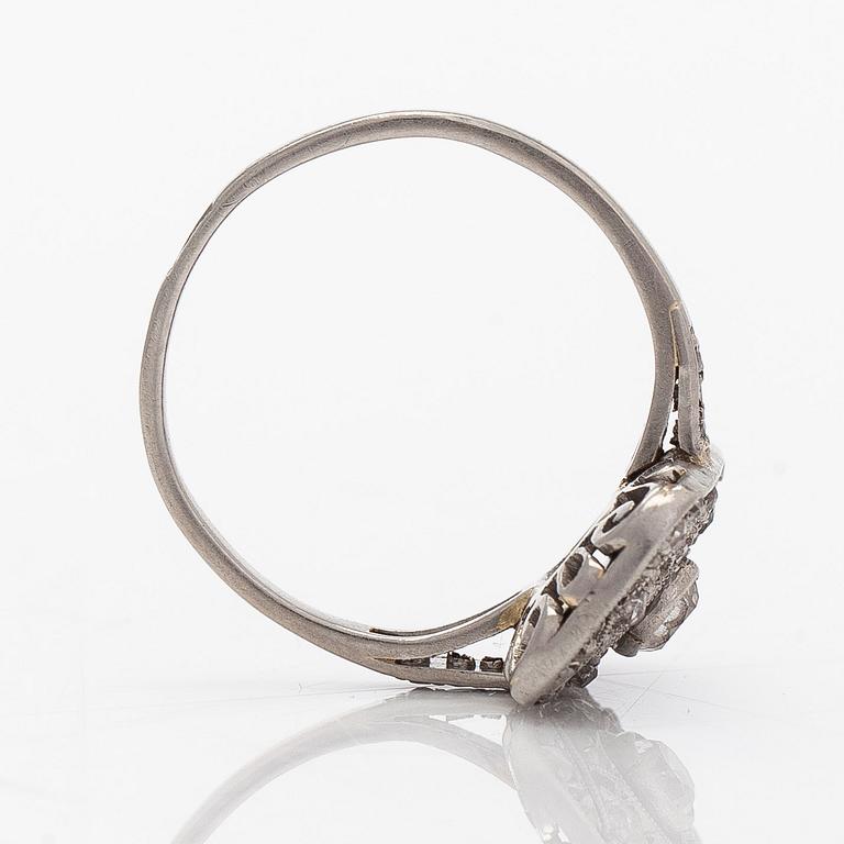A platinum art deco ring with old-cut and rose-cut diamonds, Moscow, first half of the 20th century.