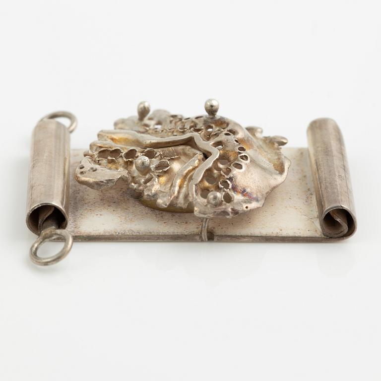 Lars Arby, four pendants with a chain and a neck ring, silver, Gothenburg 1965, 1969, 1976 and 1982.