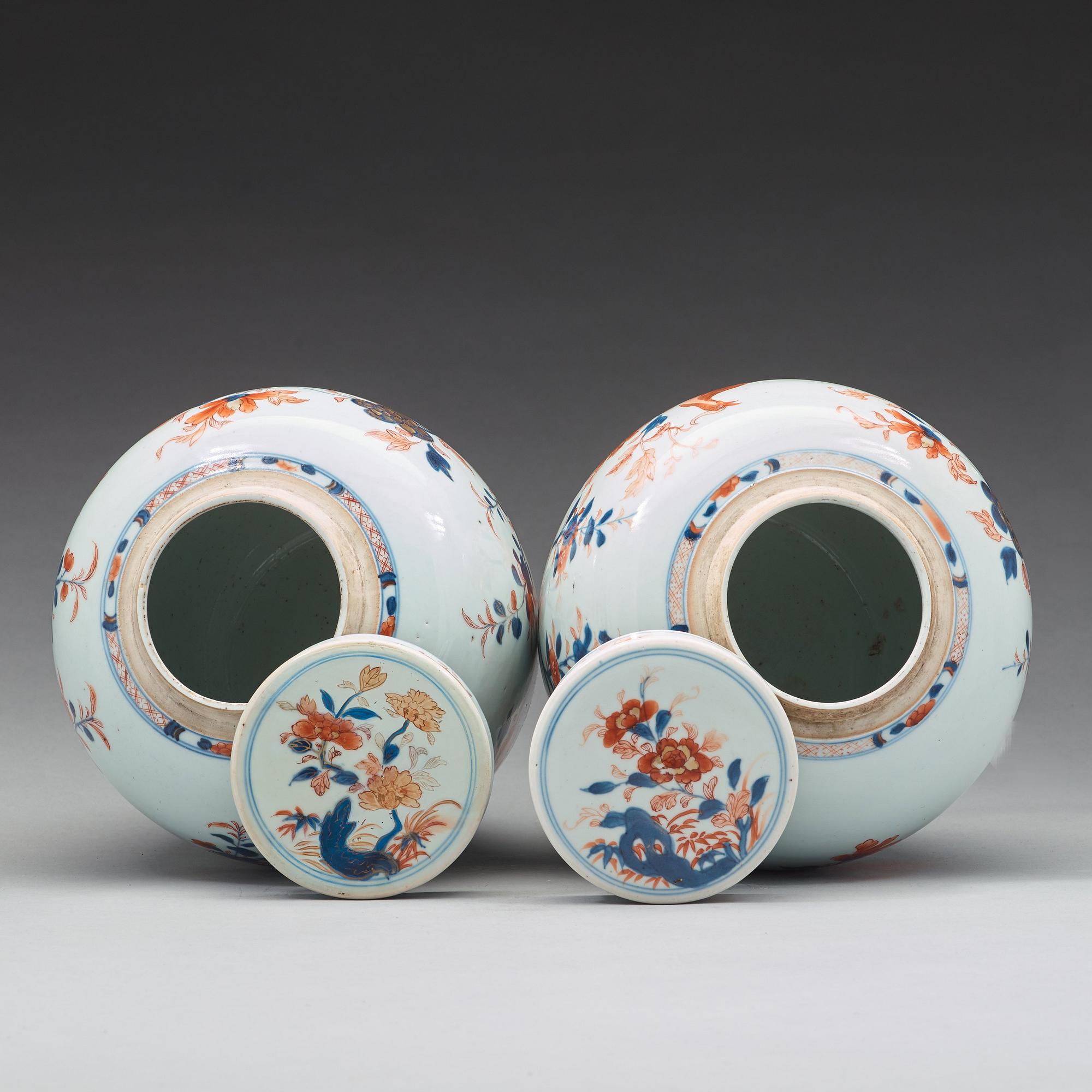 A pair of imari jars with covers, Qing dynasty, 18th Century.