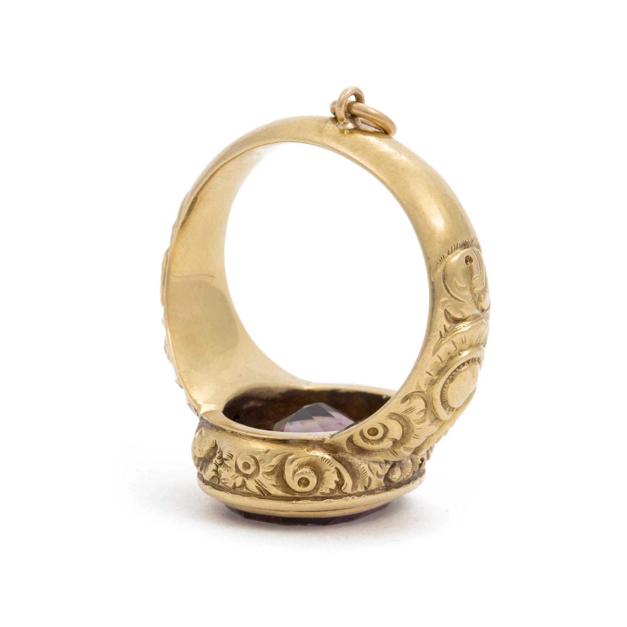 A signet ring set with amethyst.