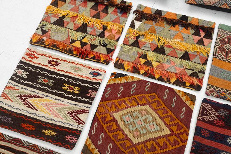 Nine Kilim pillow cases and two Kilim pillows, around 1970, ca. 50 x 50 cm.