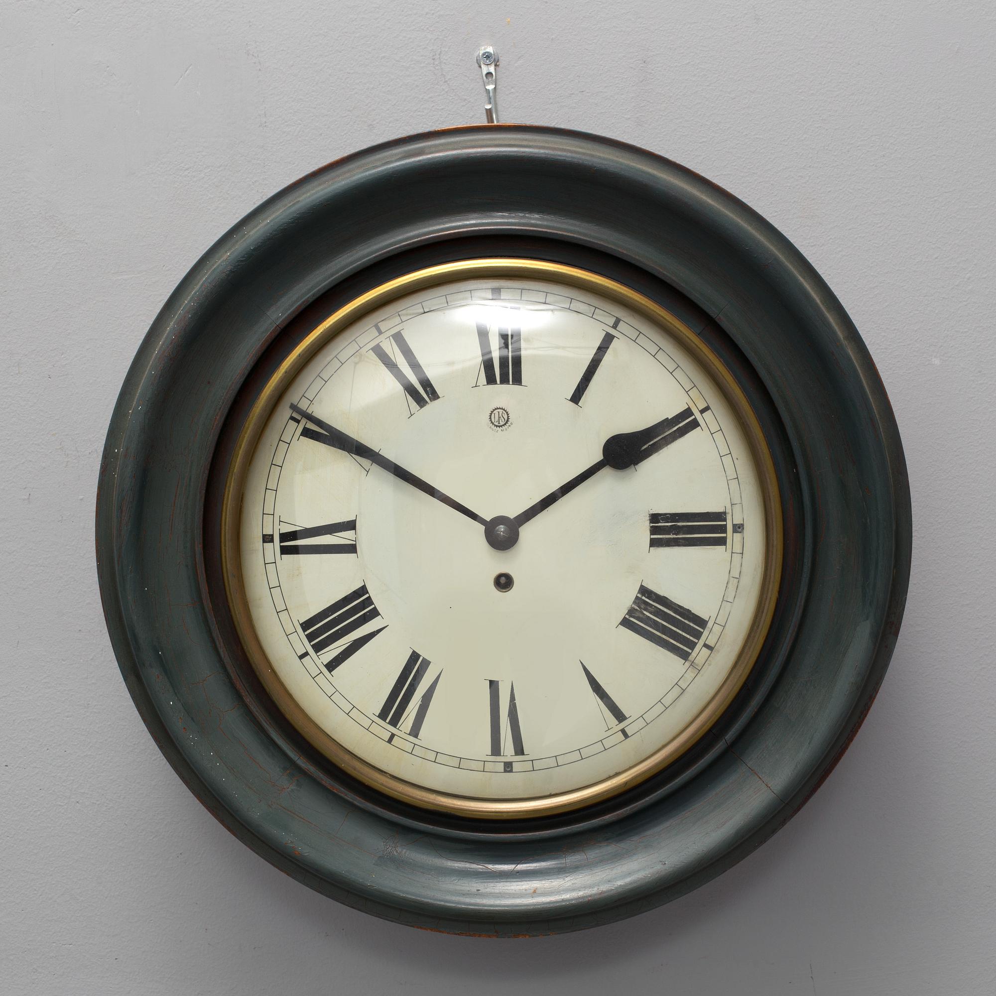 A 19th century wall clock marked LFS Schutz Marke, Germany.