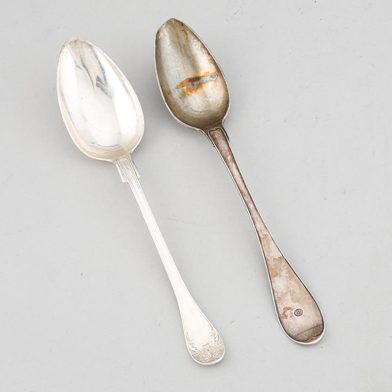 Two swedish 19th century silver serving spoons.